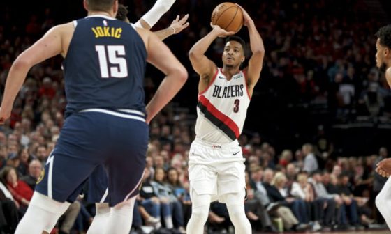 CJ_McCollum_Nikola_Jokic_Blazers_Nuggets_2019_AP